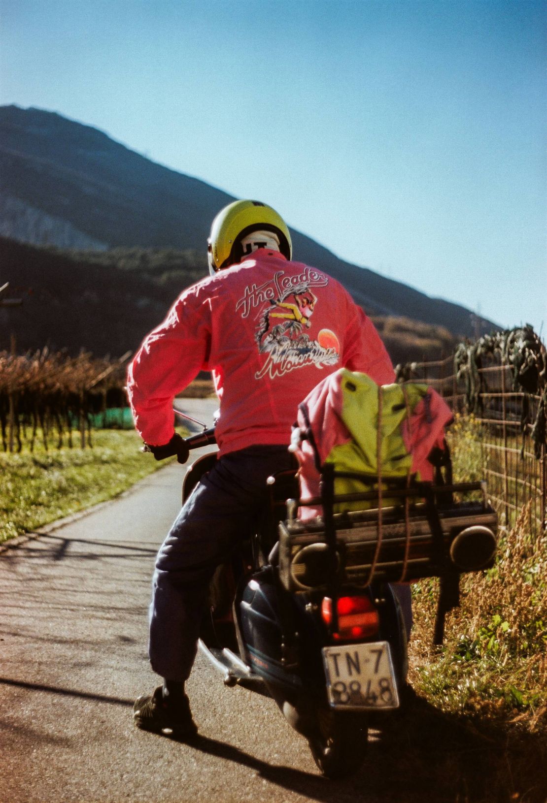 by Kuba Sobotka Kuba Sobotka, Adam riding a Vespa, R1-27A_res_res