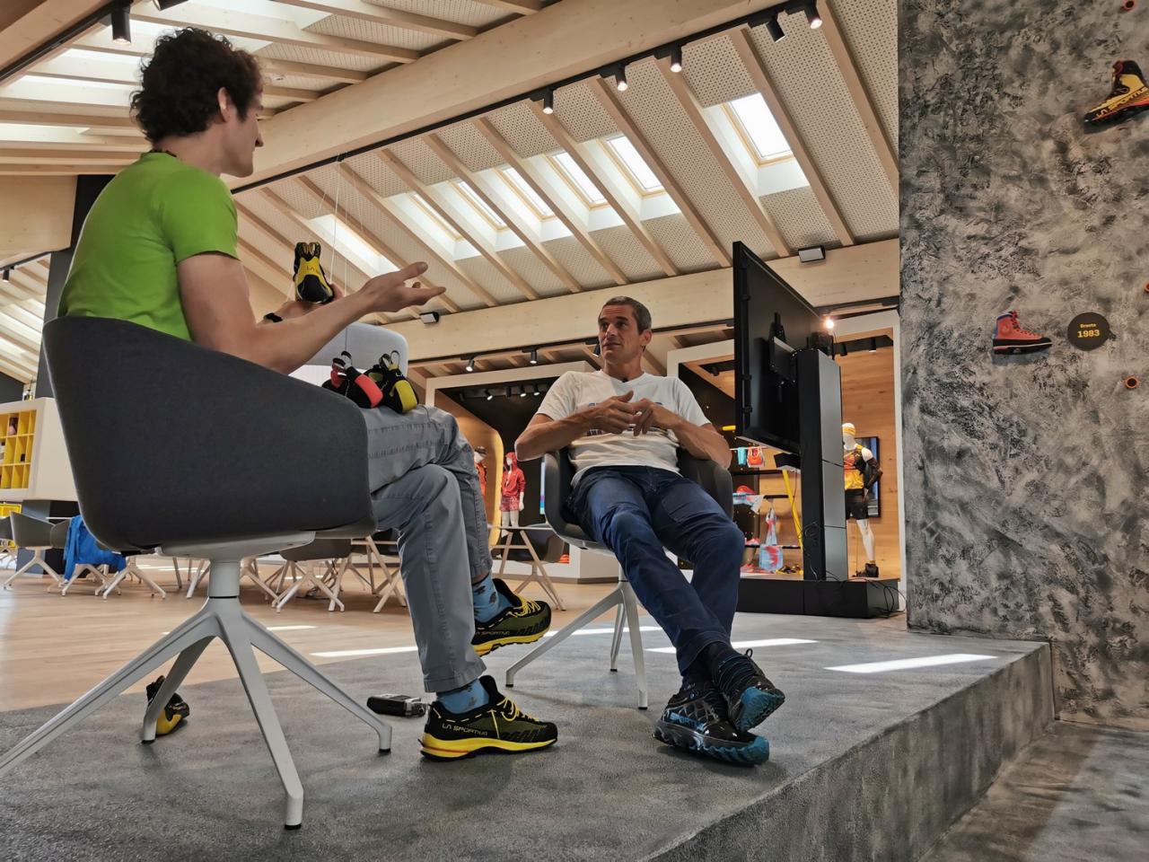 Adam talks with Pietro in La Sportiva